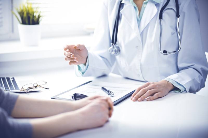 A Harding Medical Institute provider reviewing care with a patient